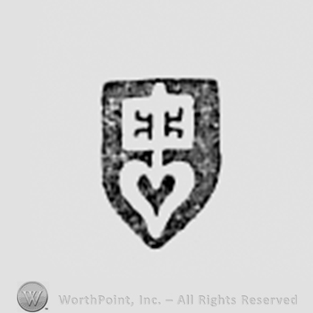 Key and heart on a shield.