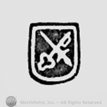 A key and a cross on a shield.