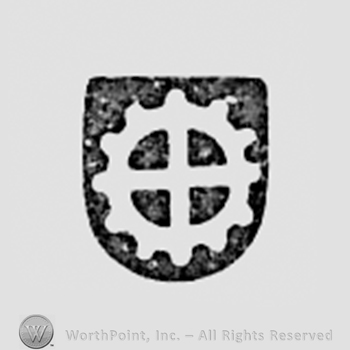 Wheel on a shield.