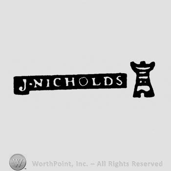 J Nicholds written near a tower.