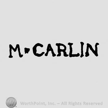 M Carlin written.