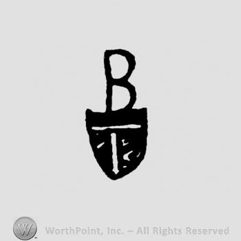 Letter B on top of a shield with letter T inside.