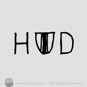 Shield between letters HD.
