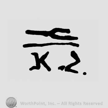 A fork on top;letters K Z below.