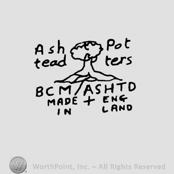 A tree in the middle;Ashtead Potters written on top;BCM ASHTD MADE IN ENGLAND written at the bottom.