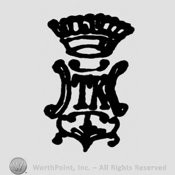 Shield with crown on top;letters TK in the middle.