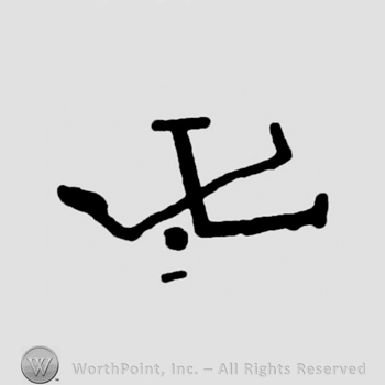 Letter X and a dot.