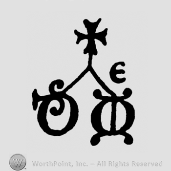 Cross on top;letter E on the right side and two circles below.