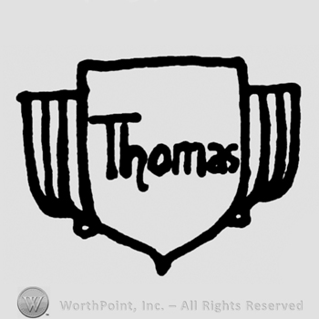 Word Thomas inside a shield,