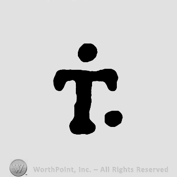 Letter T with two dots.