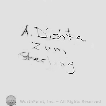 A Dishta Zuni Sterling written.