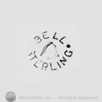 A bell in the middle; Bell Sterling written In circle.