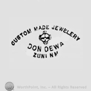 Custom Made Jewelery written on top ; Don Dewa Zuni Nm below.