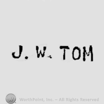 J W Tom written.