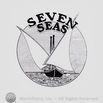 Boat on the sea and SEVEN SEAS written above.