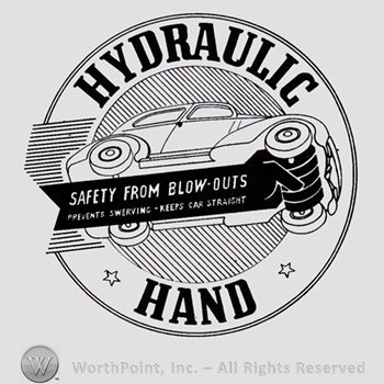 Car inside a circle and text SAFETY FROM BLOW-OUTS PREVENTS SWERVING KEEPS CAR STRAIGHT written bellow; words HYDRAULIC HAND written on the edge of the circle.