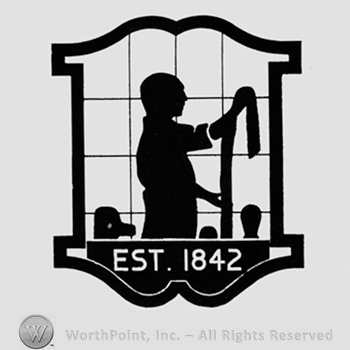Man on the window and EST.1842 written bellow.