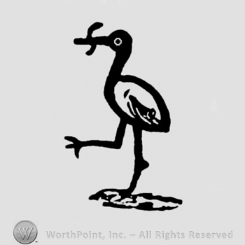 A stork with a fish in its beak
