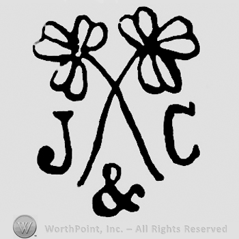 Two crossed flowers and J & C written.