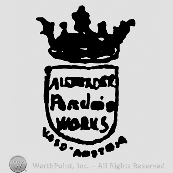 A shield with crown and some words inside:ALEXANDER.