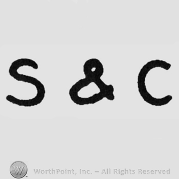 Capital letters "S & C"