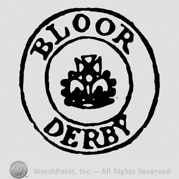 Shape made from two circles with a cross inside and BLOOR DERBY written outside.