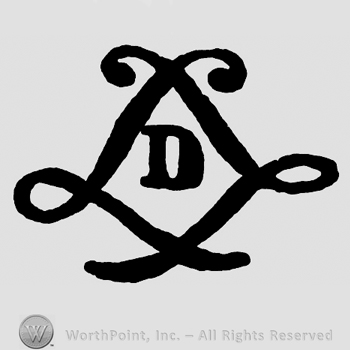 Shape similar to a diamond and letter D inside.