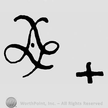 Shape similar with a diamond made from curved lines with a dot inside and a cross near.