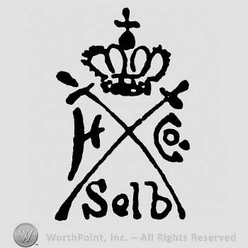 Crown with cross on top;two crossed swords and word Selb below.