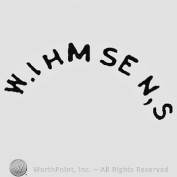 Curved bold capital lettering "W.IHMSEN,S"