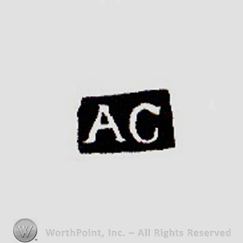 The letters AC written with uppercase letters