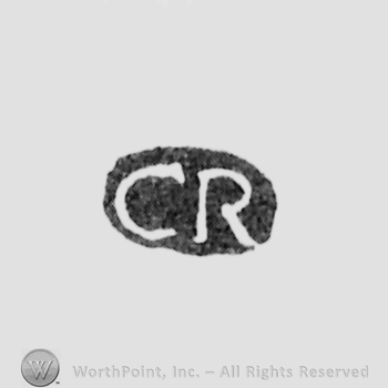 The letters CR written in uppercase