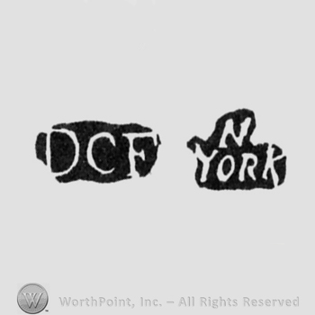 The letters DCF written in uppercase next to N York leaned to the right also writen in uppercase, the letter 'N' written above the word 'York'