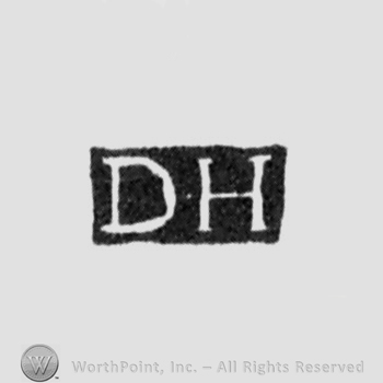 The letters DH written in uppercase