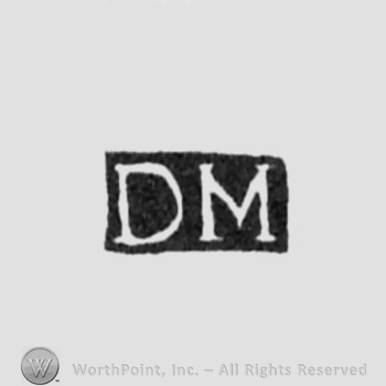 The letters DM written in uppercase