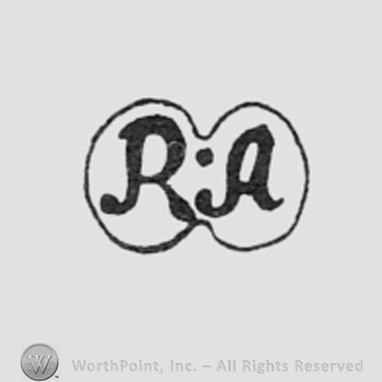Letters RA with a point between.