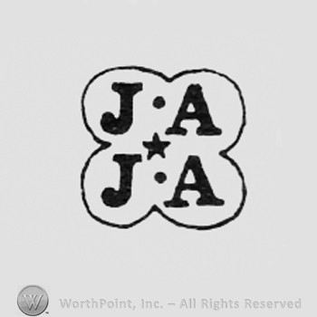 Letters JA and IA inside a frame like a cross; also a star in the middle.