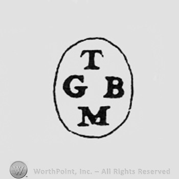 Letters TGMB inside a frame like an oval.
