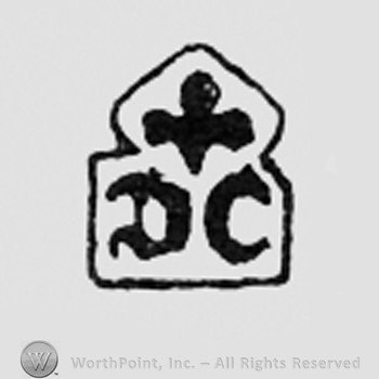 Fleur-de-lis above letters D and C.