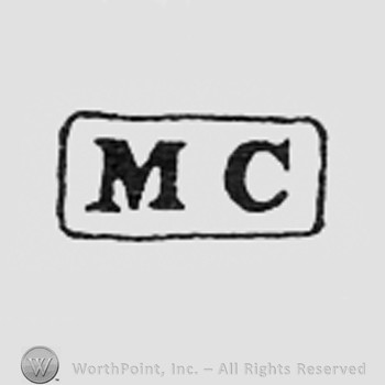 Letters MC inside an rectangle.