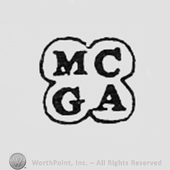 Letters MC and GA.