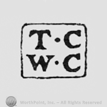Letters TC WC inside a square.