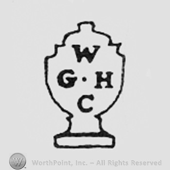Letters W G H C on a shape like a shield.
