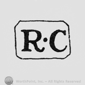 Letters RC inside a rectangle.