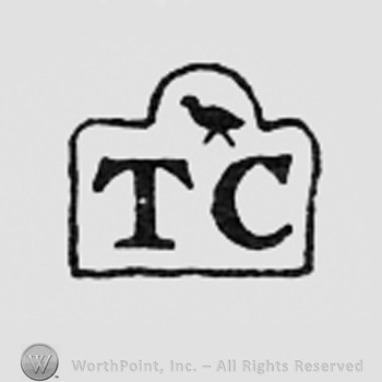 Little bird above letters TC.