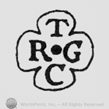 Letters TRCG inside a shipe like a clover.