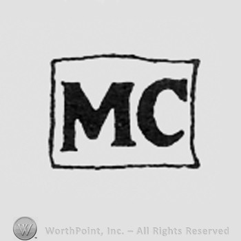 Letters MC inside a square.
