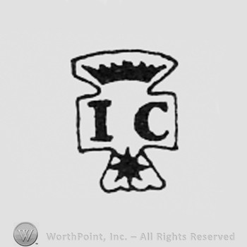 Crowned letters IC above a star.