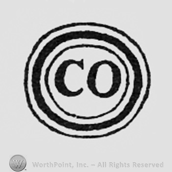 Letters CO inside a circle.