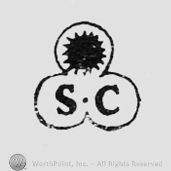 Dot above letters SC.